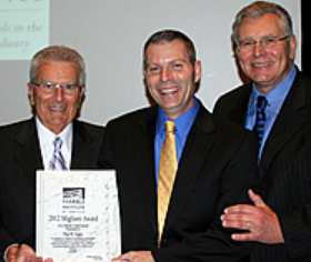 Paul Vigna, son Chris, and John Sekora.